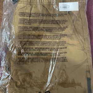 Boys old navy new casual cargo in package size 18plus xxl, gold with draw string